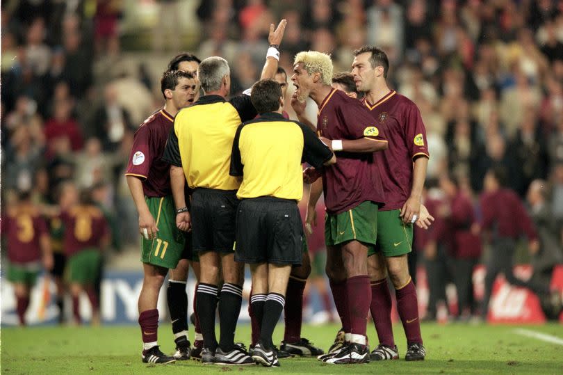Abel Xavier rages at referee Gunter Benko during the Euro 2000 semi-final between Portugal and France