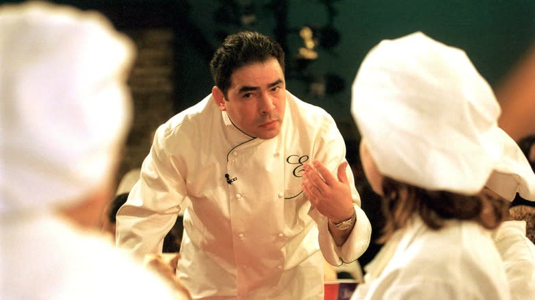 Emeril Lagasse talking to chefs