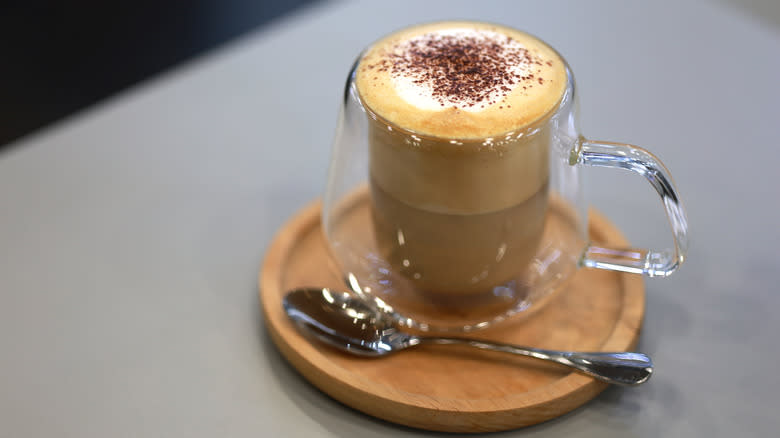 Frothy coffee in mug