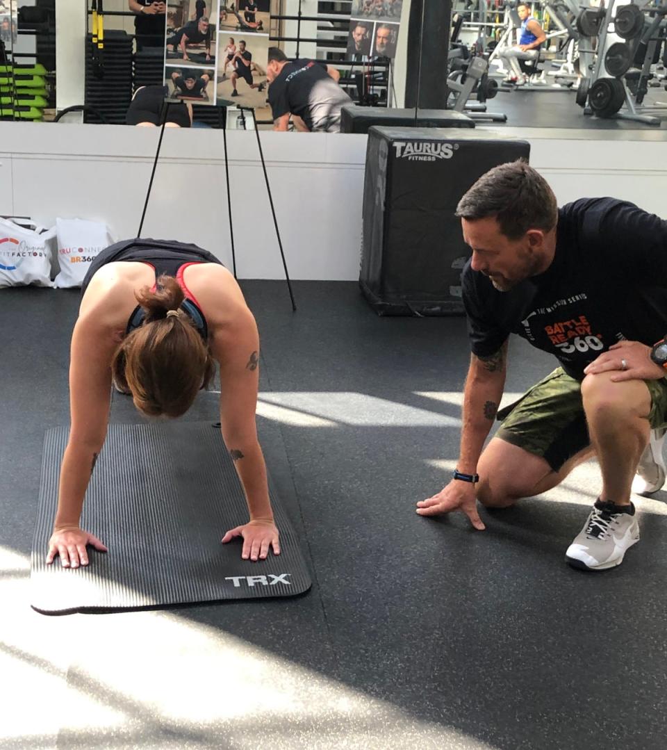 Ollie Ollerton putting journalist Abi Jackson through her paces (Abi Jackson/PA)