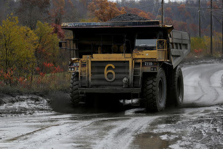 A heavy dump truck carries waste rock, known as gob, from coal mining operations at the Century Mine in Beallsville, Ohio, U.S., November 7, 2017. REUTERS/Joshua Roberts