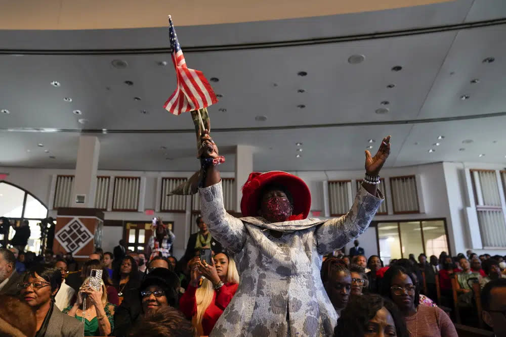 People attend a service honoring Martin Luther King Jr. at Ebenezer Baptist Church in Atlanta, Sunday, Jan. 15, 2023. (AP Photo/Carolyn Kaster)