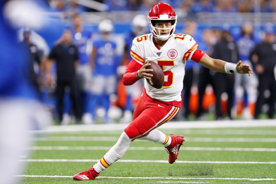Kansas City Chiefs quarterback Patrick Mahomes (15) runs with the ball during the fourth quarter against the Detroit Lions at Ford Field.