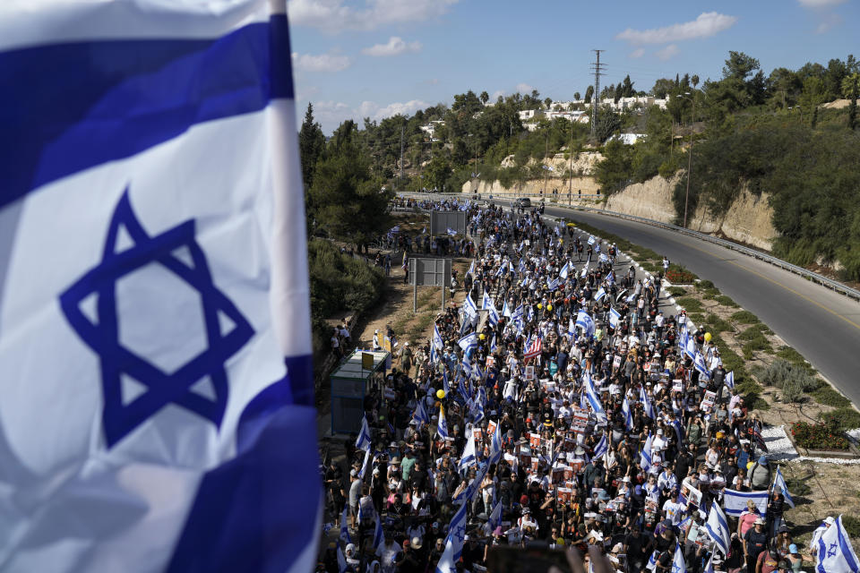 Family and supporters of the estimated 240 hostages held by Hamas in Gaza complete the final leg of a five-day solidarity rally calling for their return, from Tel Aviv to the Prime Minister's office in Jerusalem, in the town of Mevaseret Zion, near Jerusalem, Saturday, Nov. 18, 2023. The hostages, mostly Israeli citizens, were abducted during the brutal Oct. 7 Hamas cross-border attack in Israel and have been held in the enclave since as war rages. (AP Photo/Leo Correa)