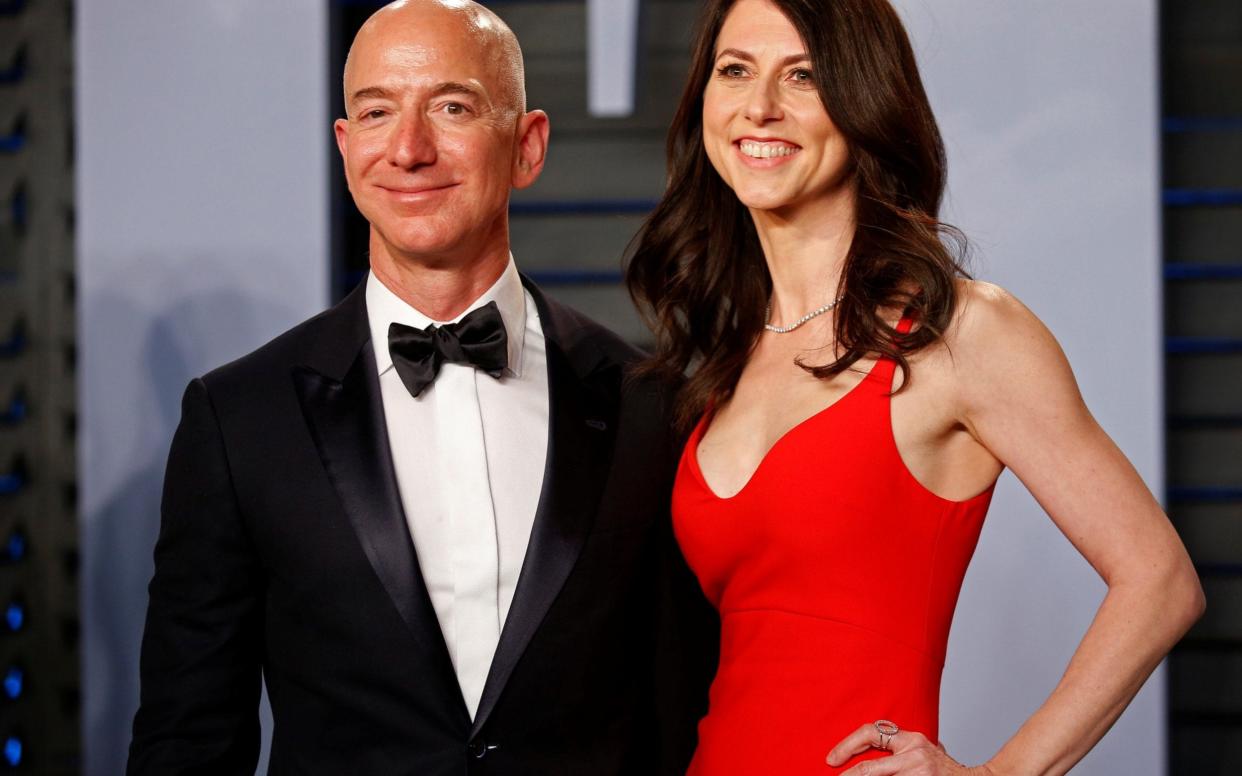 Jeff and MacKenzie Bezos reach record divorce agreement - REUTERS