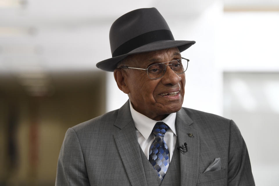 FILE - Willie O'Ree, the first black player to compete in the NHL, arrives for a meeting on Capitol Hill in Washington, in this July 25, 2019, file photo. The Boston Bruins say they are retiring the jersey of Willie O’Ree, who broke the NHL’s color barrier. O’Ree will have his jersey honored prior to the Bruins’ Feb. 18 game against the New Jersey Devils. He became the league’s first Black player when he suited up for Boston on Jan. 18, 1958 against the Montreal Canadiens, despite being legally blind in one eye. (AP Photo/Susan Walsh, File)