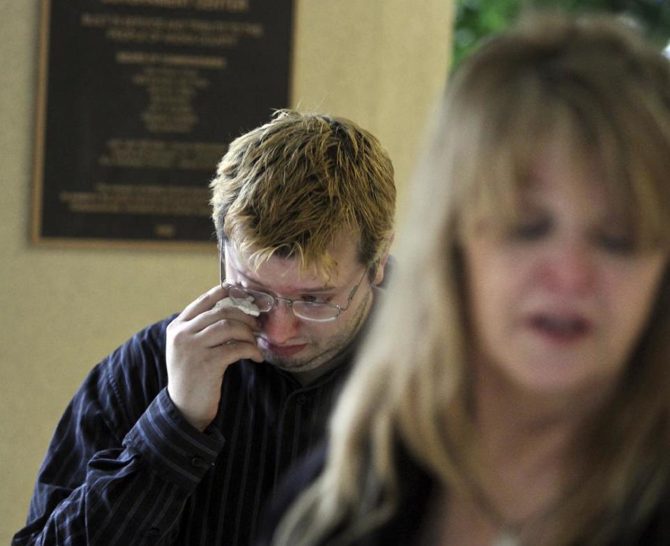 Jill Robinson, right, speaks as her oldest son John wipes away tears at the Anoka County Courthouse, Thursday, March 22, 2012, in Anoka, Minn. Robinson's son Trevor died after taking the synthetic drug, supplied by Timothy LaMere. Twenty-two-year-old Timothy LaMere pleaded guilty Thursday in Anoka County he'll receive nine years, nine months in prison when he's sentenced May 25. (AP Photo/The Star Tribune, David Joles) MANDATORY CREDIT; ST. PAUL PIONEER PRESS OUT; MAGS OUT; TWIN CITIES TV OUT