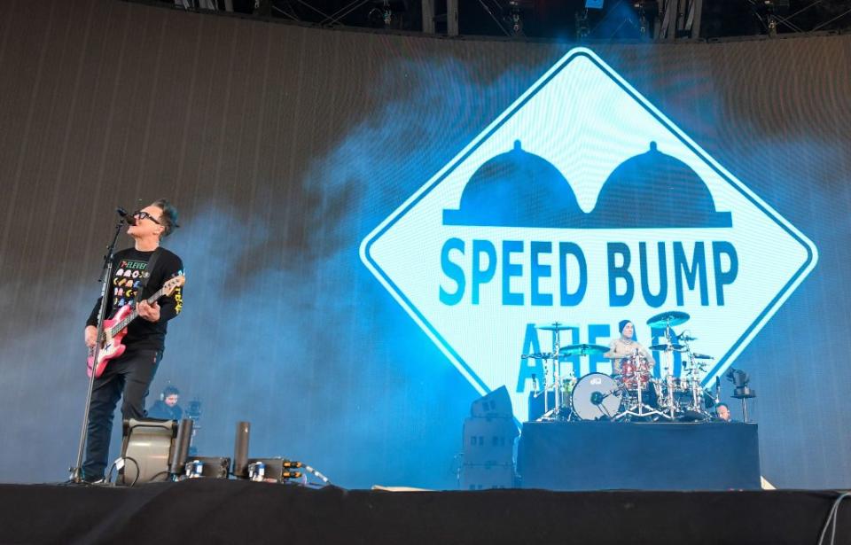 Blink-182 band members Mark Hoppus (L) and Travis Barker (R) perform during the first week-end of Coachella Valley Music and Arts Festival in Indio, California, on April 14, 2023. (Photo by VALERIE MACON / AFP) (Photo by VALERIE MACON/AFP via Getty Images)