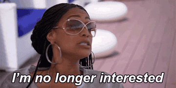 Tami Roman raises a shoulder in a small shrug and says, "I'm no longer interested," on Basketball Wives