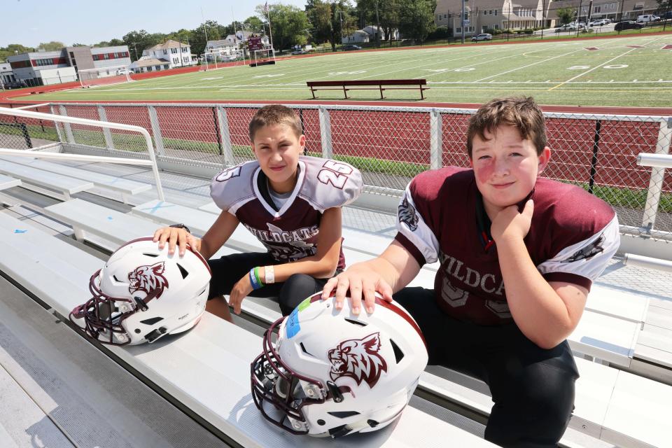 School choice students, from left, Jazz Kilcoyne, 13, and Bradyen Allstun, 10, seen here on Friday, Aug. 26, 2022, were told by the Old Colony Youth Football League they cannot play football for the West Bridgewater Youth Football Association (WBYFA) because they do not live in town.