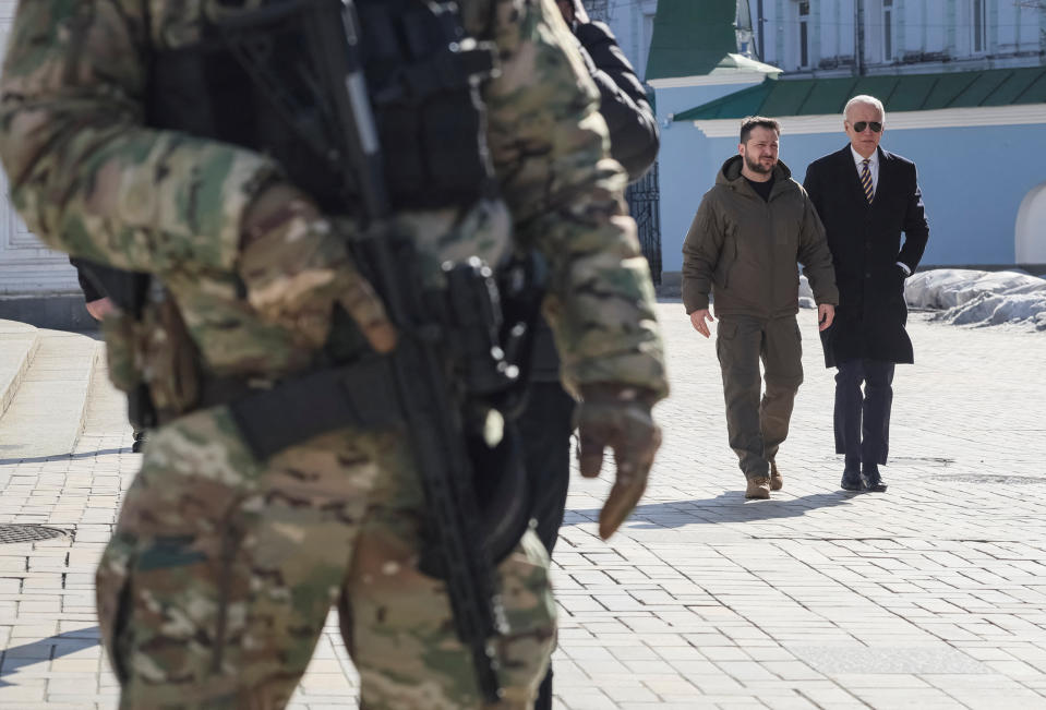 U.S. President Joe Biden and Ukraine's President Volodymyr Zelenskiy visit to Saint Michael’s cathedral, amid Russia's attack on Ukraine, in Kyiv, Ukraine February 20, 2023. REUTERS/Gleb Garanich