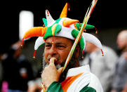 An India supporter as rain delays play during the ICC Champions Trophy Final at Edgbaston, Birmingham.