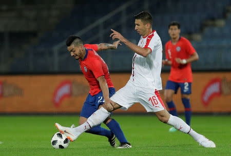 Soccer Football - International Friendly - Serbia vs Chile - Merkur-Arena, Graz, Austria - June 4, 2018 Serbia’s Marko Grujic in action with Chile’s Lorenzo Reyes REUTERS/Heinz-Peter Bader