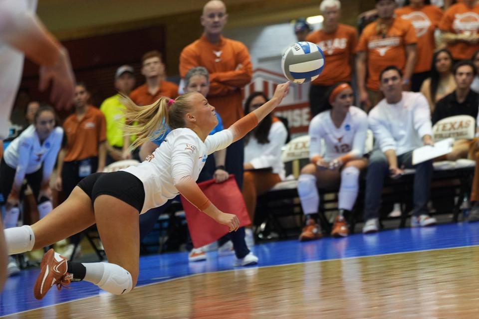 Texas' Emma Halter dives for the ball during the Texas Longhorns game against Marquette at Gregory Gym on Thursday, Dec. 8, 2022. 