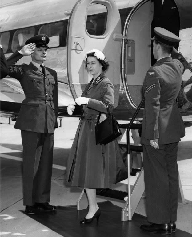<p>The Queen looked regal as she stepped off the plane at the official opening of Gatwick airport on June 9, 1958.</p>