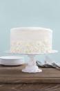 <p>Pre-made fondant daisy flowers give this cake centerpiece status.</p><p><strong><a href="https://www.countryliving.com/food-drinks/recipes/a35037/lemon-coconut-cake-with-mascarpone-frosting/" rel="nofollow noopener" target="_blank" data-ylk="slk:Get the recipe for Lemon-Coconut Cake;elm:context_link;itc:0;sec:content-canvas" class="link ">Get the recipe for Lemon-Coconut Cake</a>.</strong></p>