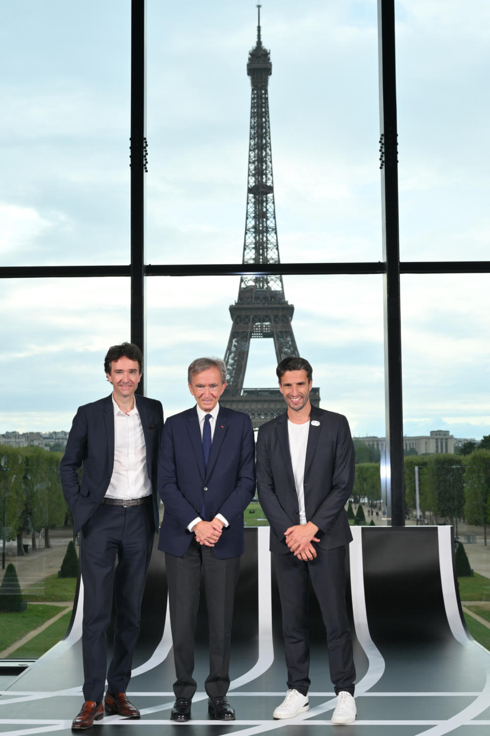 Antoine Arnault, head of communications, image and environment at LVMH, Bernard Arnault, chairman and CEO of LVMH, and Tony Estanguet, president of the Paris 2024 Organizing Committee for the Olympic and Paralympic Games.