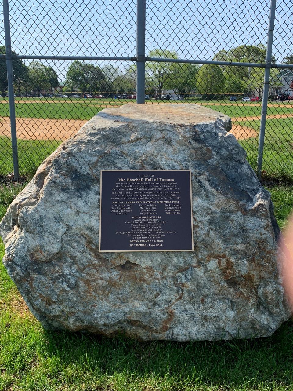 A plaque affixed to a rock behind home plate at Belmar Memorial Field honors the baseball hall of famers who played there, including Josh Gibson.