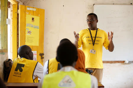 International Rescue Committee (IRC) psychologist Alex Kalatu lectures in front of health workers at the Kakuma refugees camp in northern Kenya, March 6, 2018. REUTERS/Baz Ratner