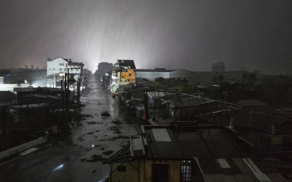 Blinding rain swept through Tuguegarao and strong winds battered houses as Typhoon Mangkhut made landfall - Getty Images AsiaPac