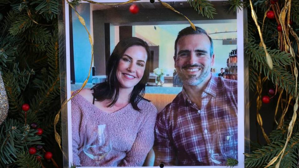 Matthew Chachere, 39, and Jennifer Besser, 36, were found dead under dense brush near the intersection of Sacramento Drive and Basil Lane in San Luis Obispo on Nov. 22, 2022, following a car crash the evening before. Police believe the driver hit the couple while traveling at excessive speed. A memorial with flowers and photos were placed where the car had hit the bridge. David Middlecamp/dmiddlecamp@thetribunenews.com