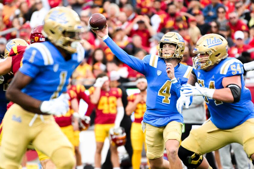 LOS ANGELES, CA - NOVEMBER 18: UCLA Bruins quarterback Ethan Garbers (4) throws a pass.