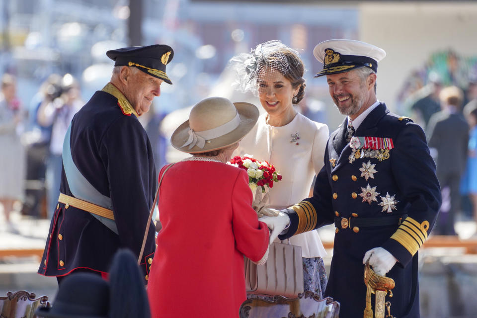 King Frederik, right, and Queen Mary of Denmark are welcomed by Norway's King Harald, left, and Queen Sonja, upon their arrival in Oslo Tuesday, May 14, 2024. (Håkon Mosvold Larsen/NTB Scanpix via AP)