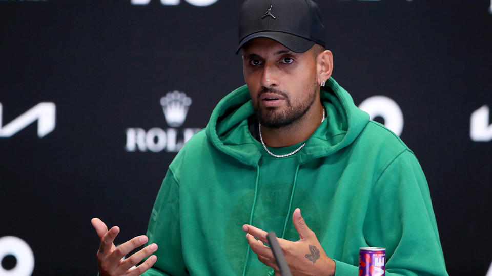 Nick Kyrgios speaks at a press conference.