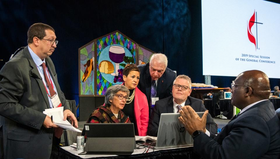 Leaders from the United Methodist Church confer Feb. 26, 2019, during the 2019 Special Session of the General Conference of the United Methodist Church in St. Louis, Missouri. 
(Photo: AP FILE PHOTO)