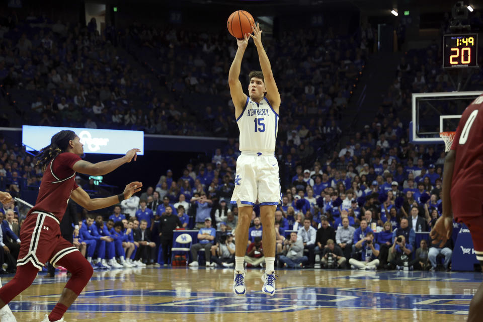 Kentucky's Reed Sheppard (15) shoots an open 3-point basket during the first half of an NCAA college basketball game against New Mexico State in Lexington, Ky., Monday, Nov. 6, 2023. (AP Photo/James Crisp)