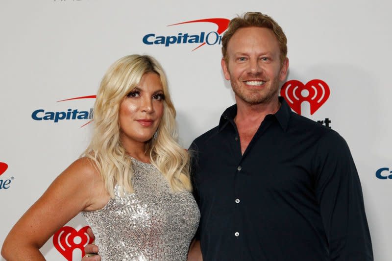 Tori Spelling and Ian Ziering arrive for the iHeartRadio Music Festival at the T-Mobile Arena in Las Vegas in 2019. File Photo by James Atoa/UPI
