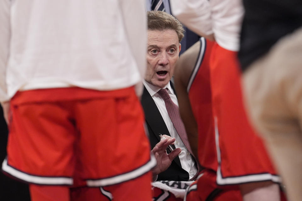 St. John's coach Rick Pitino talks to players during a timeout in the second half of the team's NCAA college basketball game against UConn in the semifinals of the Big East men's tournament Friday, March 15, 2024, in New York. (AP Photo/Mary Altaffer)