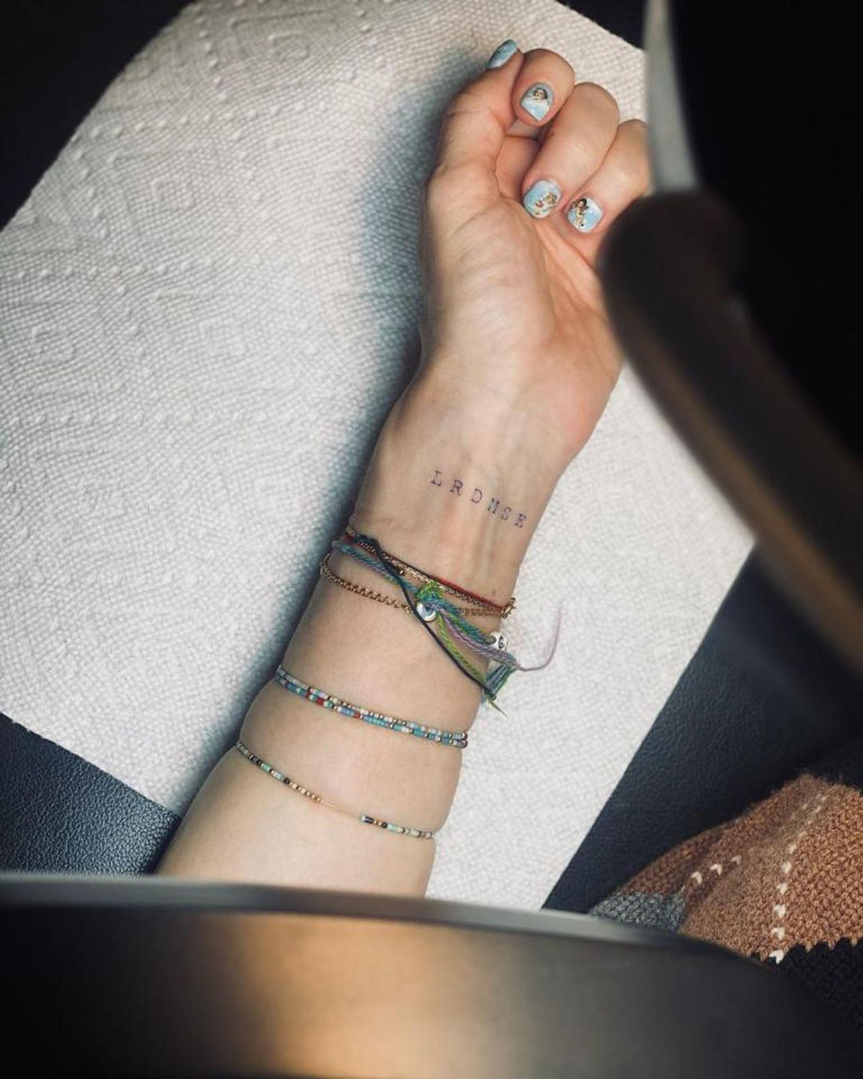 Her subtle tattoo honored her six children.  (madonna/ Instagram)