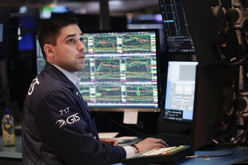 FILE - Traders work on the floor at the New York Stock Exchange in New York, Wednesday, May 3, 2023. For President Joe Biden, the past few days have raised hopes that the U.S. economy can stick a soft landing—possibly avoiding a recession as the 2024 election nears. Most U.S. adults have downbeat feelings about Biden’s economic leadership, as high inflation has overshadowed a strong jobs market. (AP Photo/Seth Wenig, File)