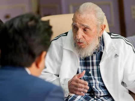 Cuba's former President Fidel Castro (R) and Japan's Prime Minister Shinzo Abe meet in Havana, Cuba, September 22, 2016, in this handout photo provided by Cubadebate. Alex Castro/Cubadebate/Handout via Reuters