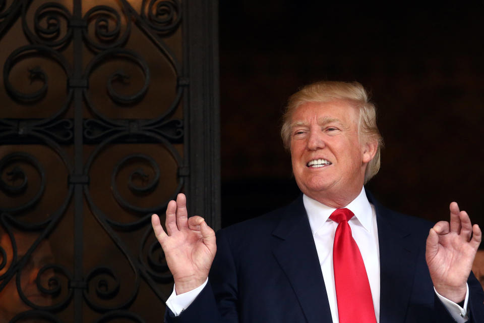 U.S. President-elect Donald Trump talks with the media at Mar-a-Lago estate where Trump attends meetings, in Palm Beach, Florida, U.S., December 21, 2016. REUTERS/Carlos Barria