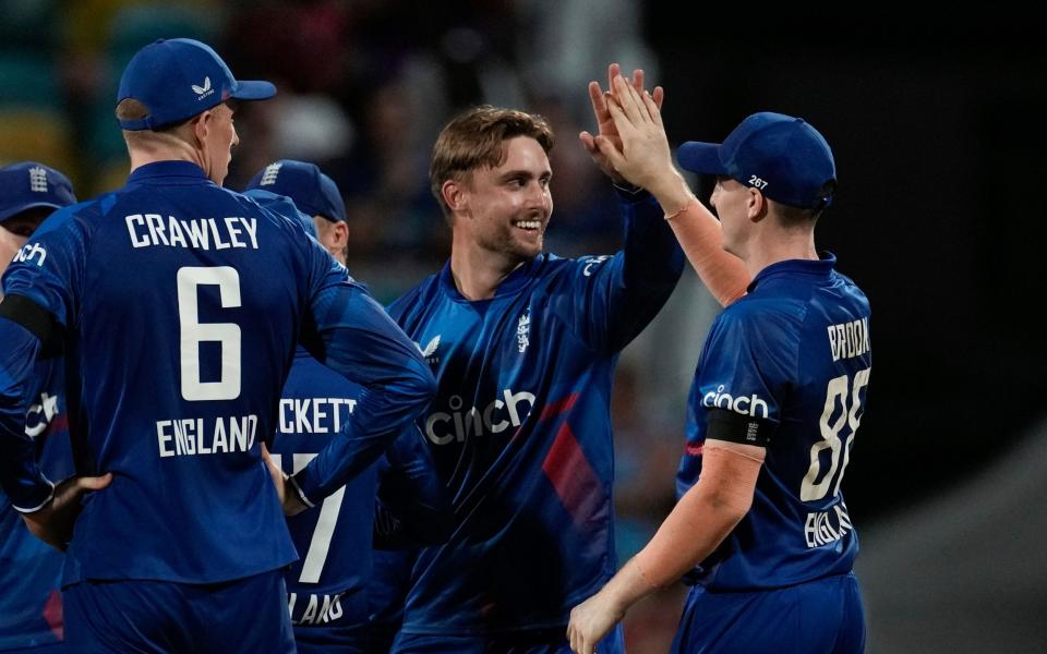 Will Jacks, (centre) celebrates the dismissal of West Indies' Keacy Carty