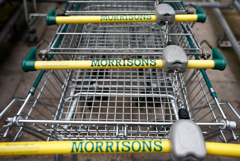 FILE PHOTO: Shopping trolleys are parked at a Morrisons supermarket in south London