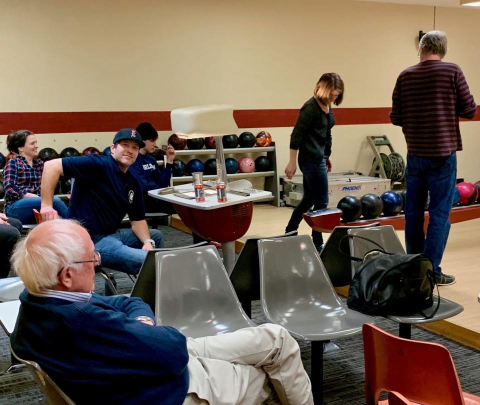 Bernie Sanders waits his turn while bowling at Saint Marks on Christmas Eve with his daughter Carina, sons Levi and Dave, grandson Cole, and niece Nicole.