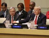 <p>United States President Donald Trump, right, pats United Nations Secretary-General Antonio Guterres’ arm before a meeting during the United Nations General Assembly at U.N. headquarters, Monday, Sept. 18, 2017. (Photo: Seth Wenig/AP) </p>