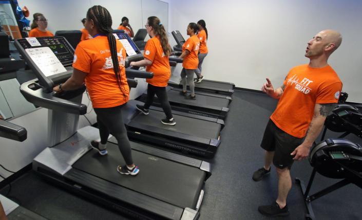 General Manager Trey Miles instruct the students on treadmills in his class at Optimum Fitness on Robinwood Road Thursday afternoon, March 31, 2022.