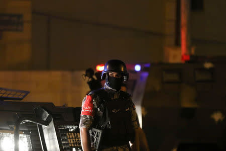 A policeman is seen near the Israeli embassy in Amman, Jordan July 23, 2017. REUTERS/ Stringer