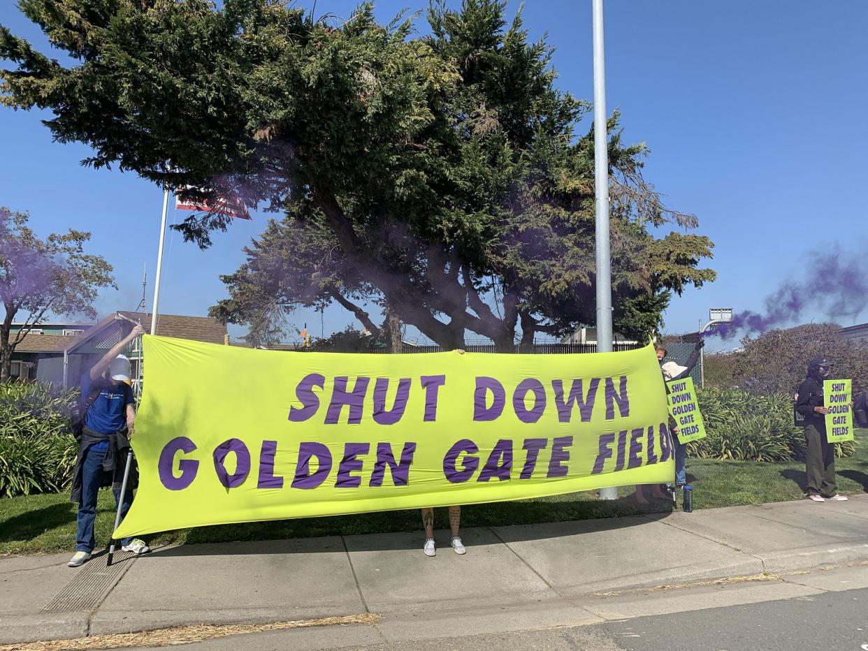 Protesters demand Golden Gate Fields be closed.