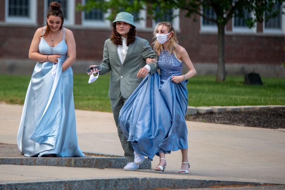 Spaulding High School students attending prom walk in a grand march Sunday, May 23, 2021 in Rochester.