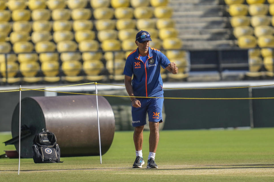 Indian cricket team head coach Rahul Dravid inspects the pitch ahead of the first cricket test match between India and Australia, in Nagpur, India, Wednesday, Feb. 8, 2023. (AP Photo/Rafiq Maqbool)