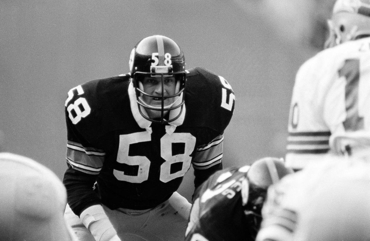 Jack Lambert (58) of the Pittsburgh Steelers gets ready for a snap against the Seattle Seahawks, Dec. 4, 1977. Lambert was selected to the Super Bowl 50 Golden Team in 2016.