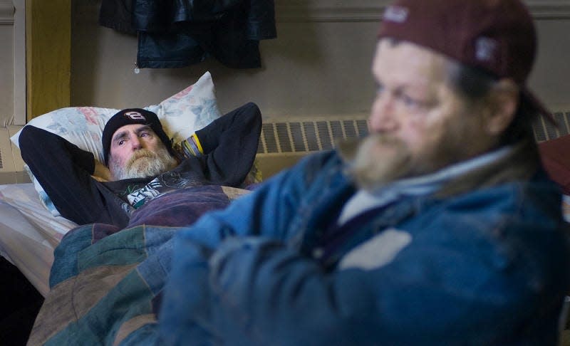 Leo Murphy (lying on cot, back left) died at age 52 in 2010. He had been homeless for years. His ashes were interred with 13 other unclaimed veterans in September 2019.