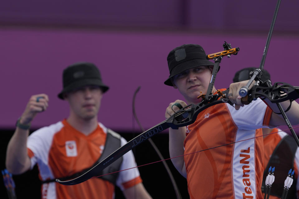 Netherlands' Sjef Van den Berg shoots an arrow during the men's team competition at the 2020 Summer Olympics, Monday, July 26, 2021, in Tokyo, Japan. (AP Photo/Alessandra Tarantino)
