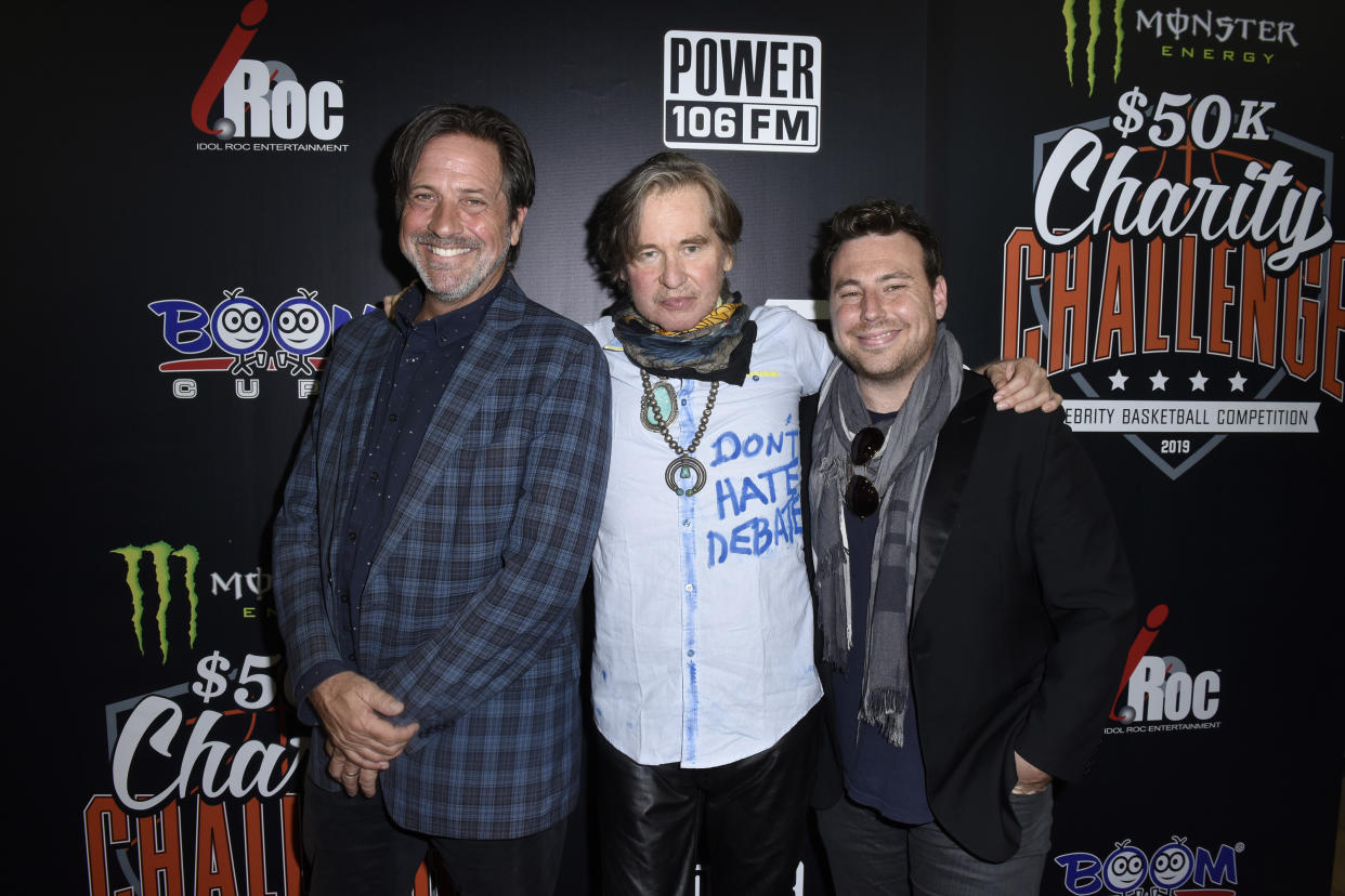 WESTWOOD, CALIFORNIA - JULY 08: Val Kilmer (C) and guests attend the Monster Energy $50K Charity Challenge Celebrity Basketball Game at UCLA's Pauley Pavilion on July 08, 2019 in Westwood, California. (Photo by Vivien Killilea/Getty Images for Idol Roc )