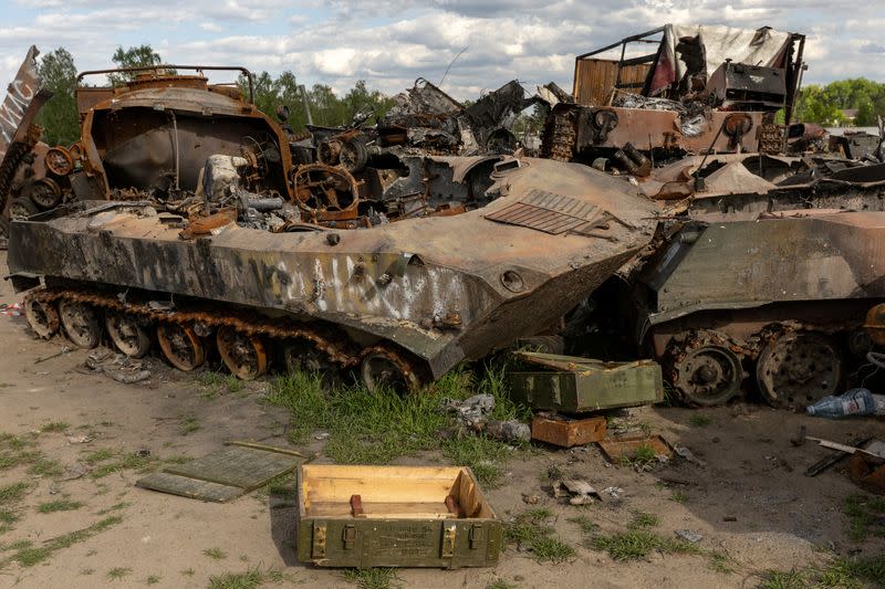 FILE PHOTO: Destroyed Russian tanks and military vehicles are seen dumped in Bucha amid Russia's invasion in Ukraine